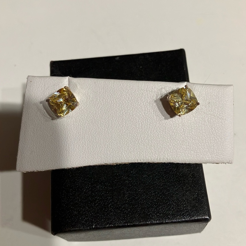 Yellow colored stud earrings